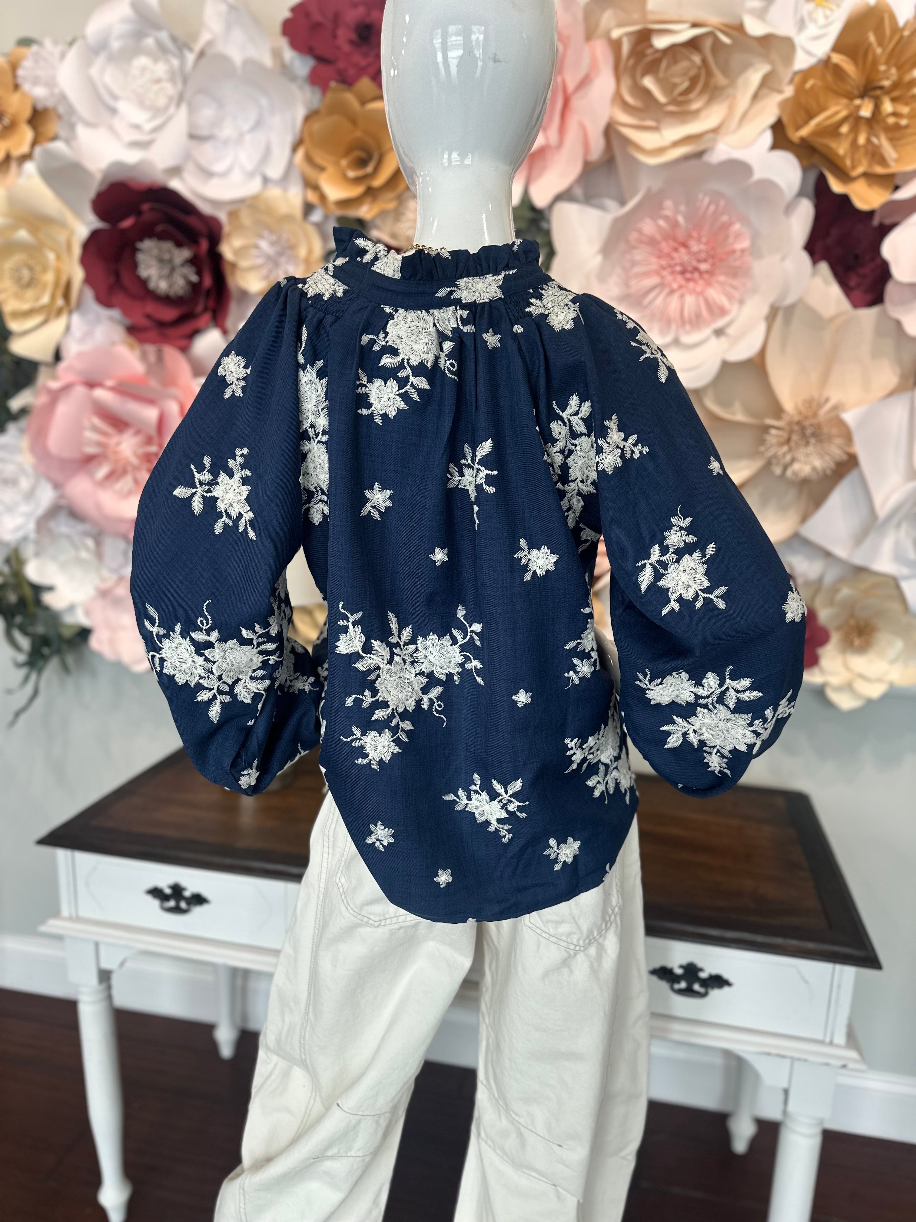 Navy Embroidered Ruffle Tie Neck top